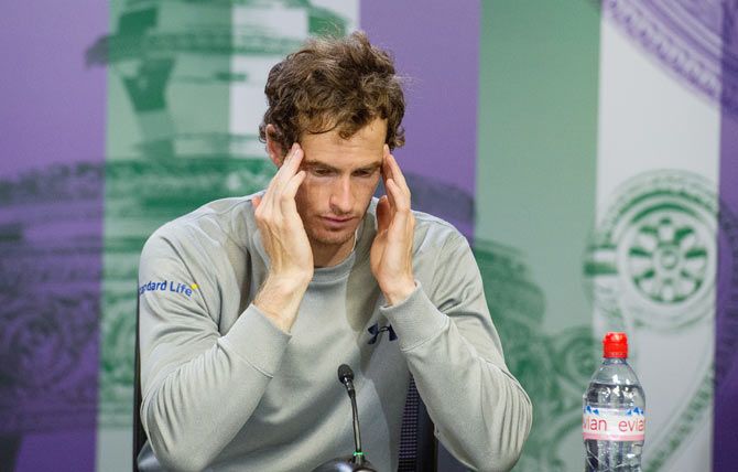 Great Britain's Andy Murray at a press conference after losing the Wimbledon semi-final against Switzerland's Roger Federer at the All England Lawn Tennis and Croquet Club in London on Friday