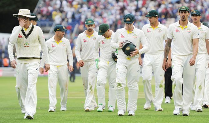 Australian players leave the field at stumps on Day 3 of the 1st Ashes Test against England at SWALEC Stadium in Cardiff on Friday