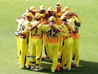 Chennai Super Kings players in a huddle before an IPL match