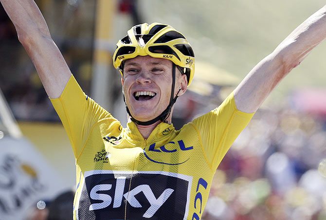 Race leader's yellow jersey, Team Sky rider Chris Froome of Britain celebrates as he crosses the finish line to win the 167-km (103.7 miles) 10th stage of the 102nd Tour de France cycling race from Tarbes to La Pierre-Saint -Martin, France, on Tuesday