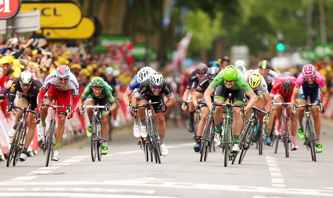 Mark Cavendish (Left of centre) Great Britain and Etixx-Quick Step and Andre Greipel (Right of centre) of Germany and Lotto-Soudal lead the sprint for the finish line during stage five of the 2015 Tour de France, a 189.5km stage between Arras and Amiens in Amiens, France, on July 8