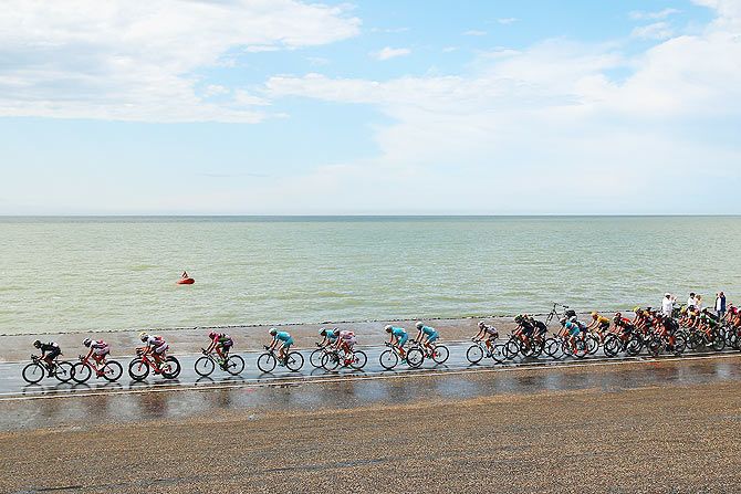 The peloton rides along the North Sea coast during stage two of the Tour de France, a 166km stage between Utrecht and Zelande, in Zelande, Netherlands, on July 5