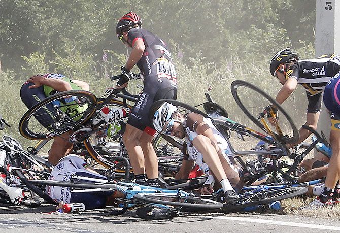 Riders and their bicycles fill the road after a fall during the 159,5 km (99 miles) third stage of the Tour de France from Anvers to Huy, Belgium, on July 6