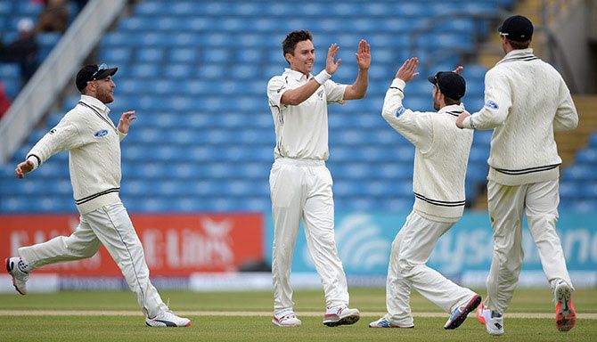 Trent Boult of New Zealand celebrates with Kane Williamson after dismissing Adam Lyth of England during day five of second Test at Headingley