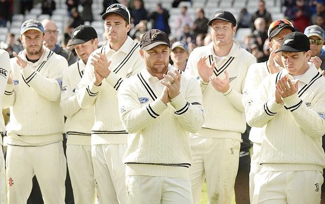 New Zealand's Brendon McCullum applauds with teammates after New Zealand won the second Test against England