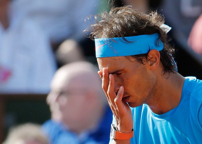 Spain's Rafael Nadal reacts during his quarter-final against Serbia's Novak Djokovic at the French Open on Wednesday