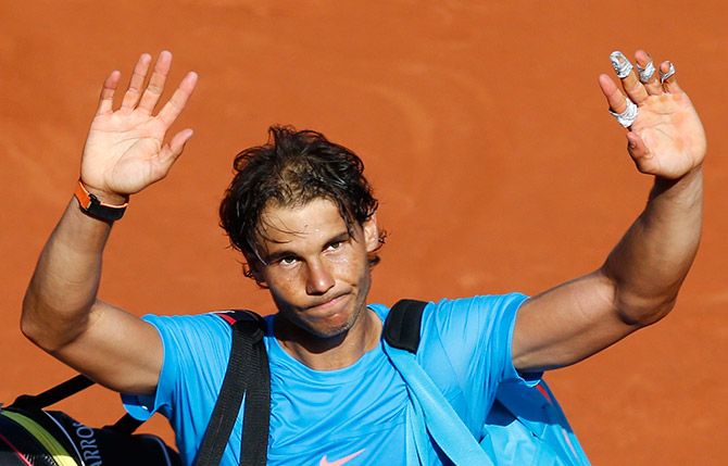 Rafael Nadal of Spain leaves the court