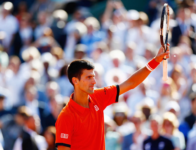 Novak Djokovic celebrates victory against Rafael Nadal