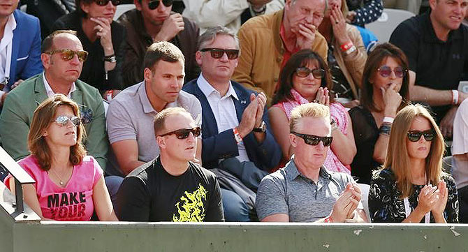 Andy Murray's Coach Amelie Mauresmo, fitness coach Matt Little, Physio Mark Bender and wife Kim Sears watch his quarter-final match against David Ferrer