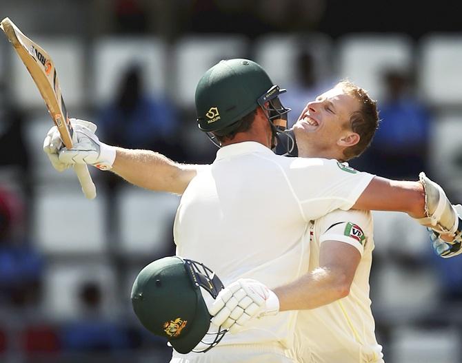 Adam Voges celebrates with Josh Hazlewood 