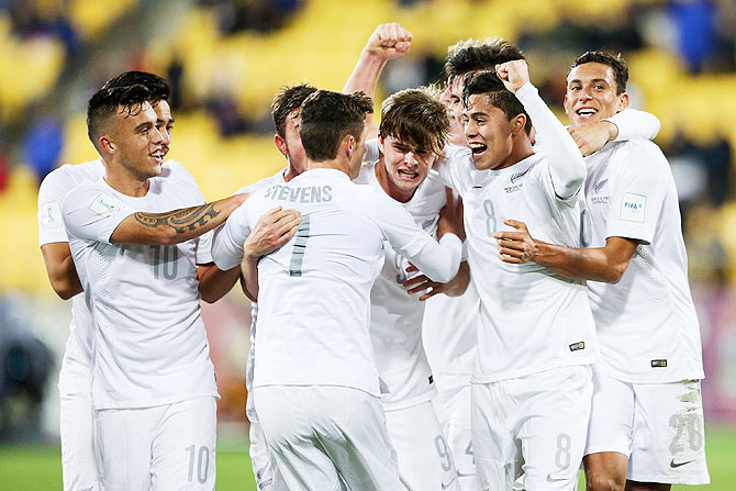 New Zealand's Joel Stevens is swamped by teammates while celebrating his goal against Myanmar during their FIFA U-20 World Cup Group A match at Wellington Regional Stadium in Wellington on Saturday