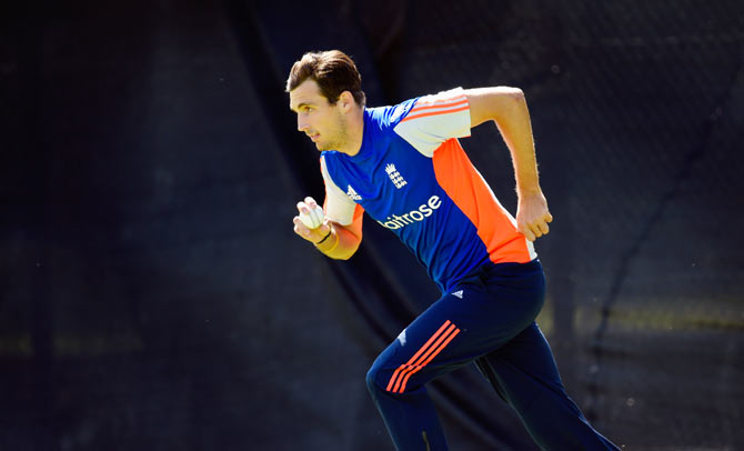 England's Steven Finn bowls in the nets