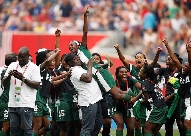 Nigeria forward Francisca Ordega (17) celebrates scoring against Sweden