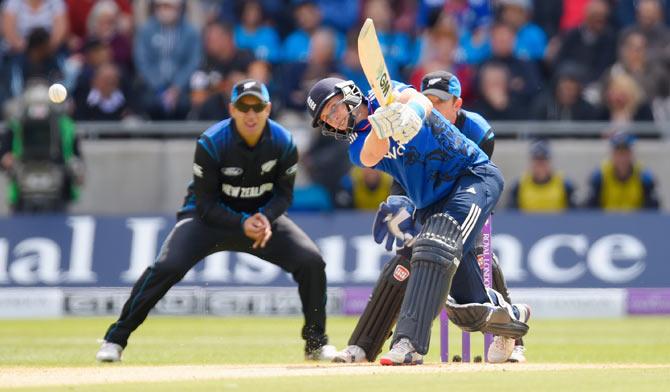 England batsman Joe Root drives a ball to the boundary