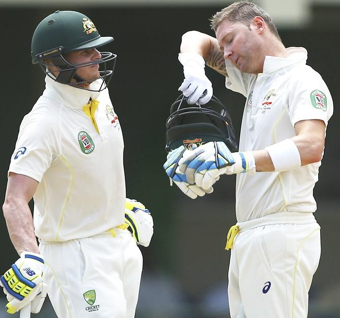 Steve Smith of Australia speaks with Michael Clarke