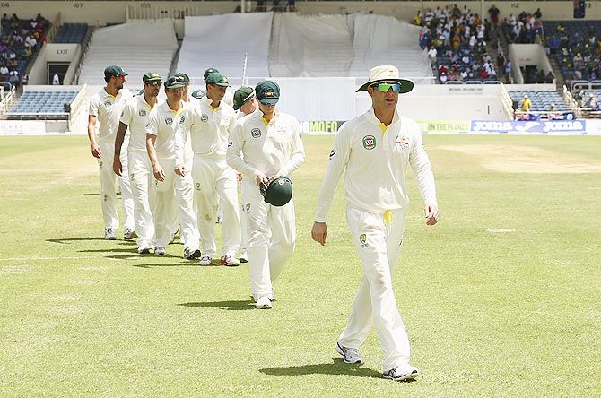 Australia captain Michael Clarke leads his team from the field after winning the second Test against West Indies at Sabina Park in Kingston, Jamaica, on Sunday