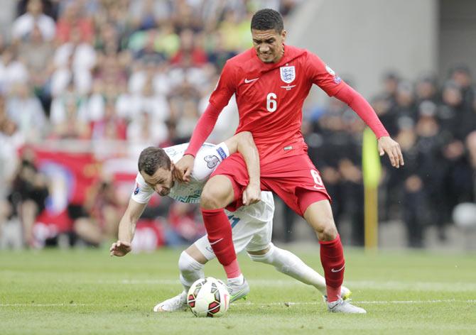 England's Chris Smalling has a shot at goal