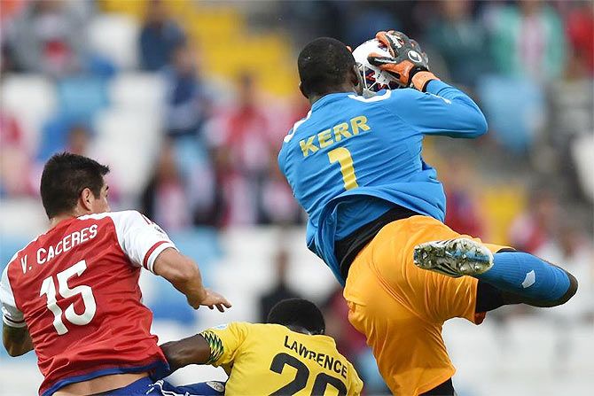 Jamaica's goalkeeper Duwayne Kerr clears the ball in a goal-mouth melee