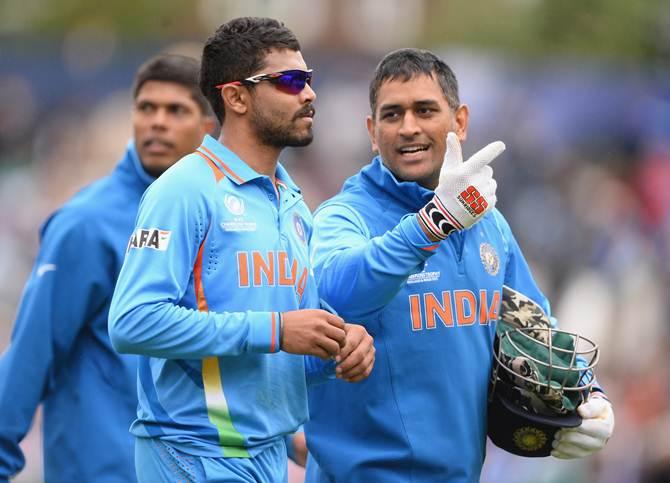 Ravindra Jadeja (left) and Mahendra Singh Dhoni