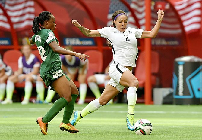 Sydney Leroux of the United States (right) is challenged by Sarah Nnodim of Nigeria during their Group D match of the FIFA Women's World Cup in at BC Place Stadium in Vancouver, Canada, on Tuesday