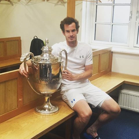 Andy Nurray poses with the Queen's trophy on Sunday