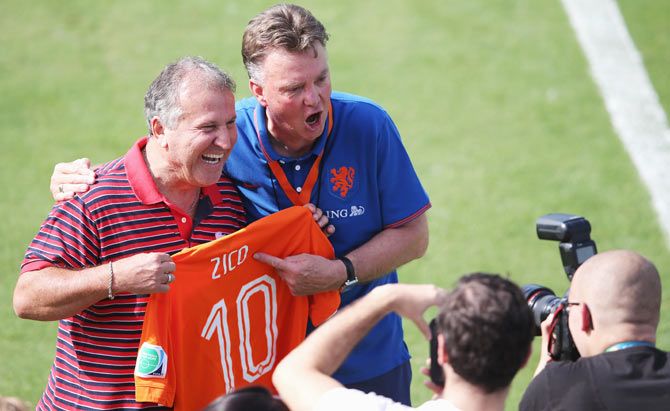 Zico (left) with Dutch football coach Louise van Gaal