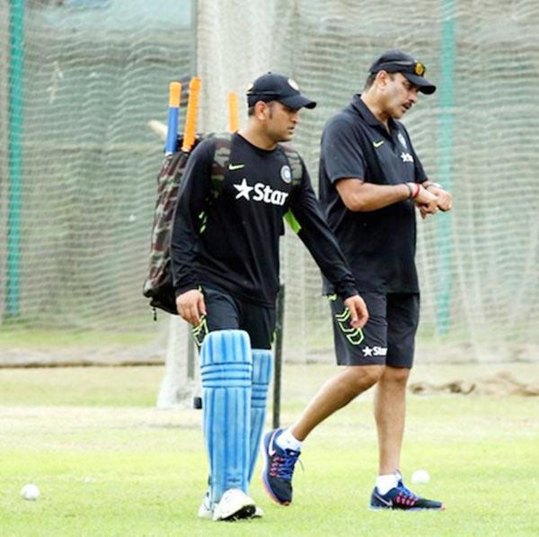 India's Mahendra Singh Dhoni with Team Director Ravi Shastri