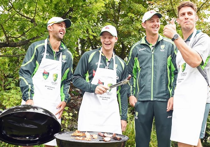 Mitchell Marsh gives a thumbs up to the BBQ food
