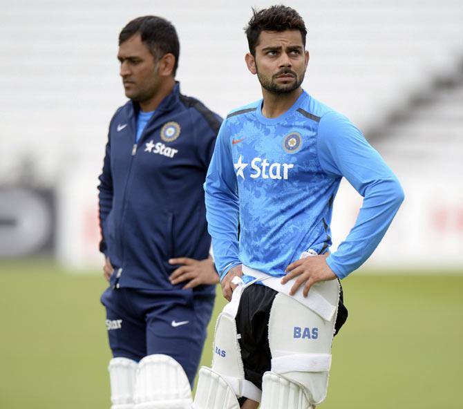 India's Mahendra Singh Dhoni (left) with Virat Kohli