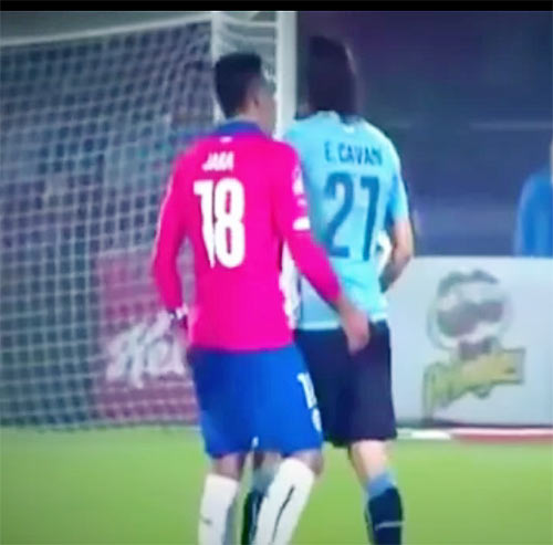 A video grab of Jara sticking his finger into Cavani's backside