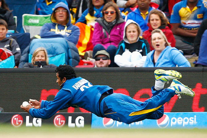 Dimuth Karunaratne of Sri Lanka catches out Kane Wlliamson of New Zealand during their match at Hagley Oval in Christchurch, on February 14