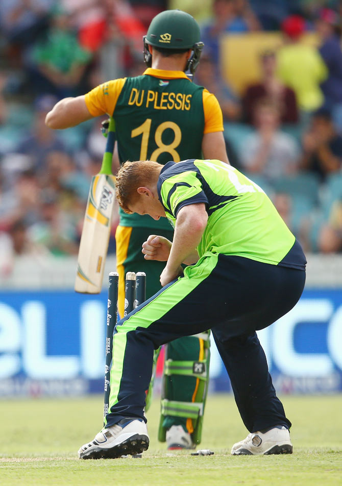 Kevin O'Brien of Ireland celebrates after dismissing Faf du Plessis of South Africa