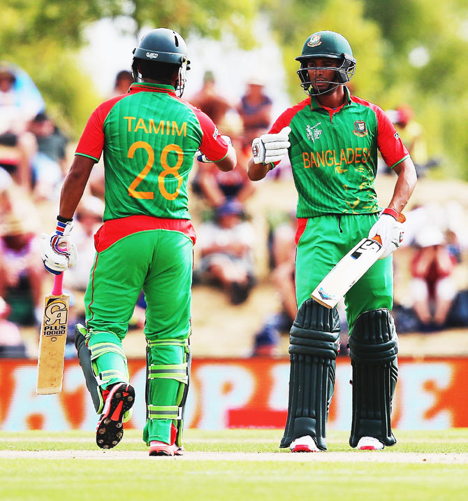 Tamim Iqbal and Mohammad Mahmudullah of Bangladesh during their 2015 World Cup match against Scotland at Saxton Field in Nelson, New Zealand, on Thursday