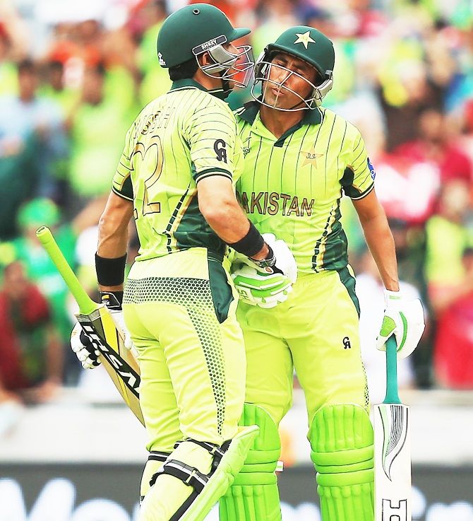 Misbah-ul-Haq of Pakistan is congratulated by Younis Khan after reaching 5000 ODI   career runs