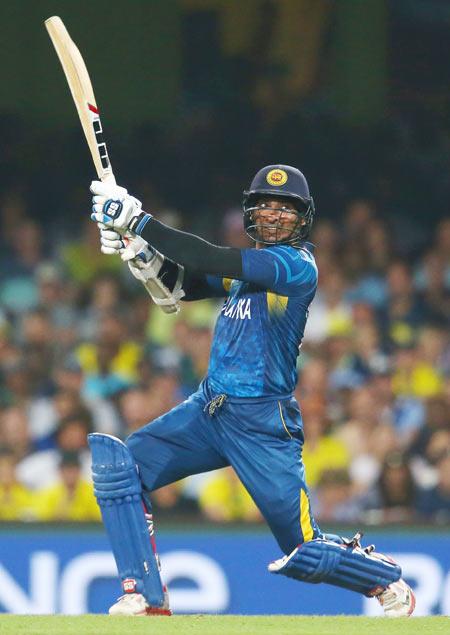 Sri Lanka's Kumar Sangakkara plays a shot on the off-side during the 2015 World Cup match against Australia at Sydney Cricket Ground in Sydney on Sunday