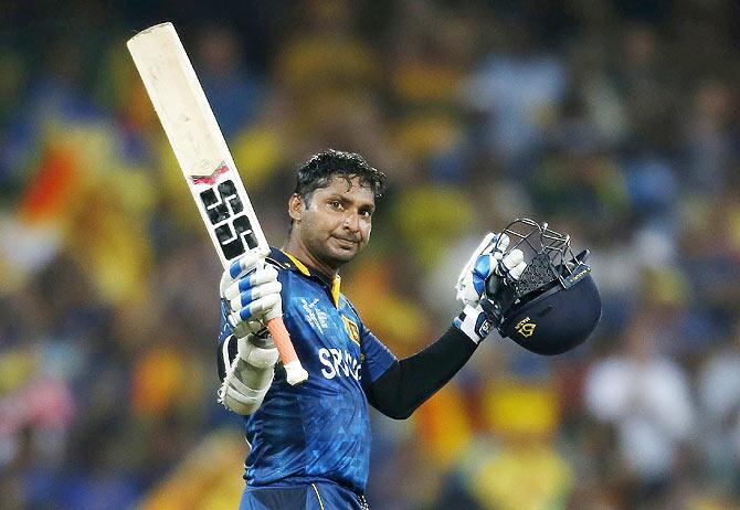 Sri Lanka's Kumar Sangakkara celebrates reaching his century against Australia during their Cricket World Cup match in Sydney on Sunday