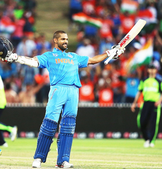 Shikhar Dhawan celebrates his 8th ODI century at Seddon Park, Hamilton, New Zealand, March 10, 2015 . Photograph: Hannah Peters/Getty Images