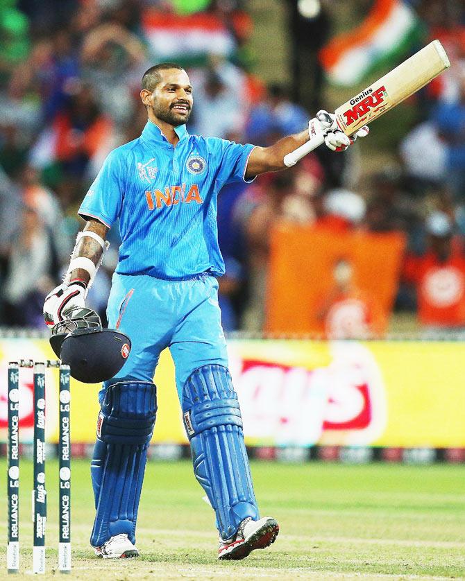 Shikhar Dhawan of India celebrates after scoring a century against Ireland