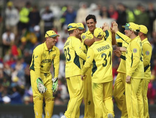 Australia's Mitchell Starc celebrates after picking up a wicket during the World Cup Pool A game against Scotland, being played in Bellerive Oval