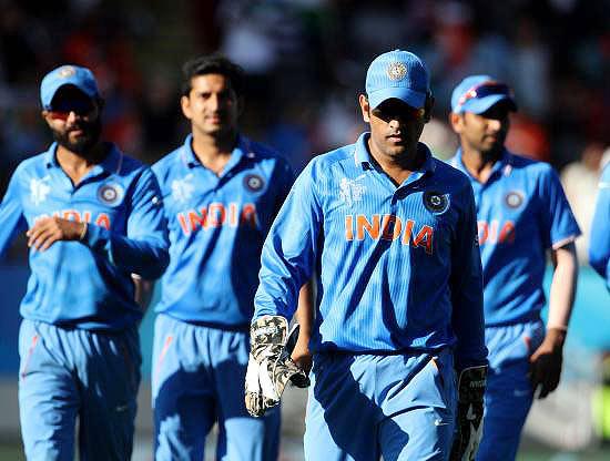 Indian players walk off  the Eden Park stadium