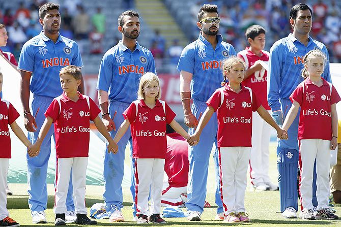 The India team sing the national anthem before the match against Zimbabwe 