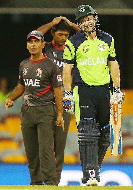 William Porterfield of Ireland smiles after the ball hit the stumps but the bails stay on