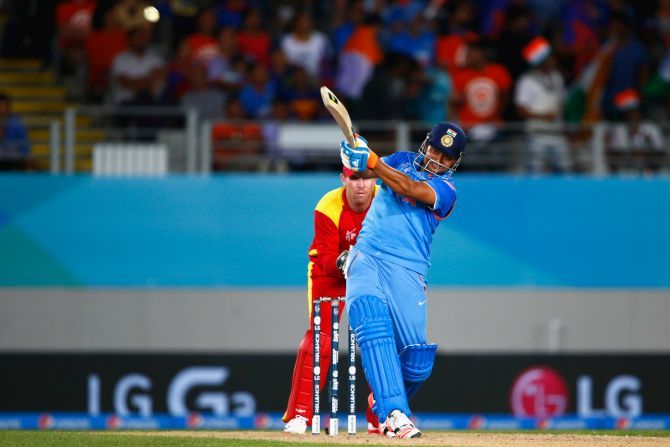 Suresh Raina during India's game against Zimbabwe at Eden Park in Auckland, on March 14, 2015 . Photograph Phil Walter/Getty Images
