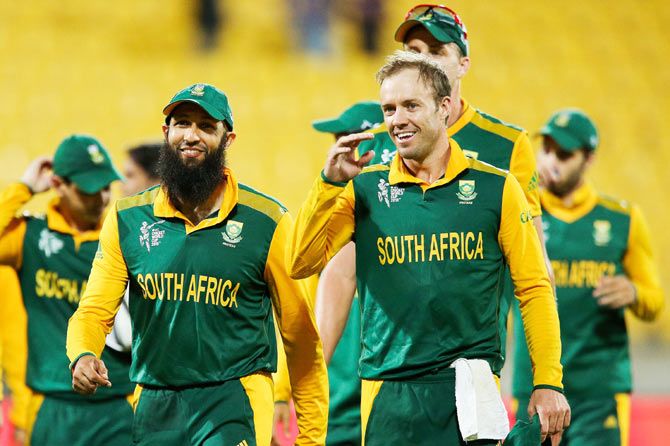 Hashim Amla (left) and AB de Villiers of South Africa are all smiles after winning their Pool match against the United Arab Emirates