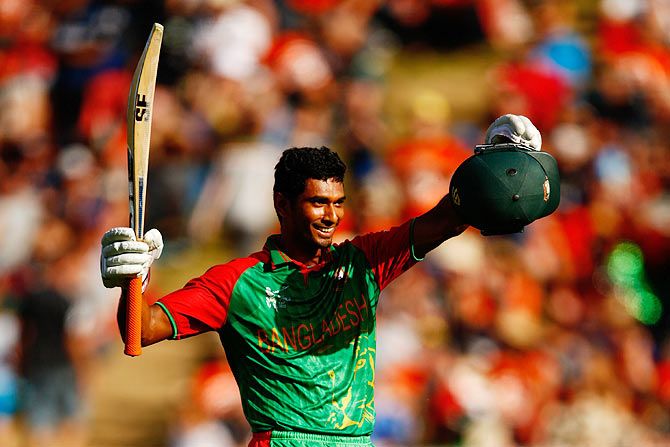 Mahmudullah of Bangladesh celebrates his century against New Zealand