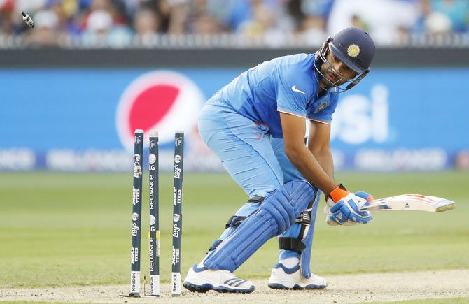  India's batsman Rohit Sharma is bowled by Bangladesh's Taskin Ahmed 