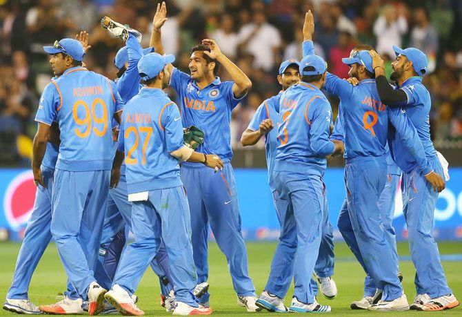 Indian players celebrate with Mohit Sharma after the fall of a Bangladesh wicket