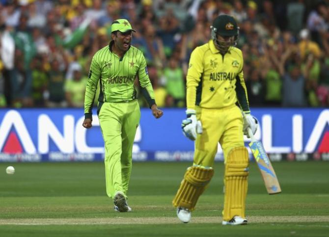 Pakistan's Sohaib Maqsood celebrates after taking a catch to dismiss Michael Clarke off the bowling