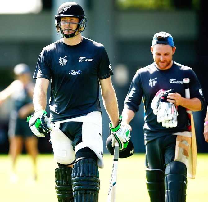 Martin Guptill, left, and Brendon McCullum of New Zealand arrive for a New Zealand Black   Caps training session at Eden Park