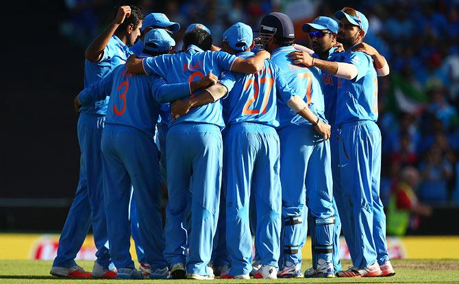 Team India in a huddle